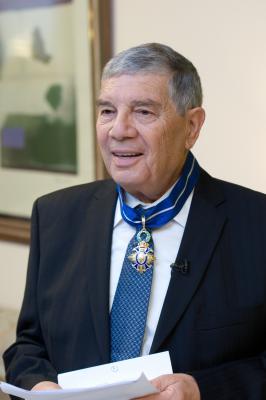 Yad Vashem Chairman Avner Shalev wearing the medal of the Spanish Order of Civil Merit